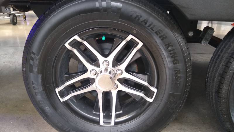 five-spoke RV tire on suspension