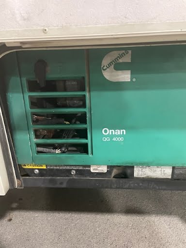 Green Onan generator onboard an RV