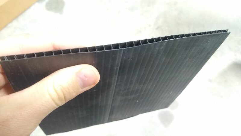 Black coroplast (corrugated plastic) underbelly material