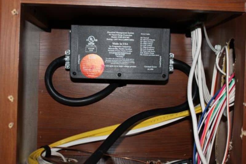 hardwired rv surge protector in cabinet