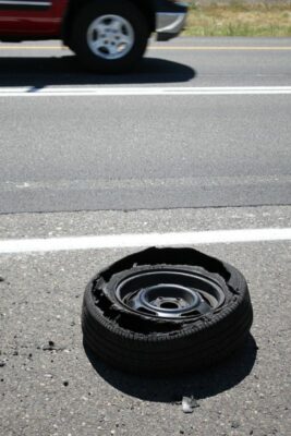 tire blowout on side of the road