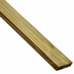 A 2x8 pressure-treated dimensional lumber board