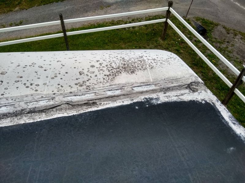old EPDM RV roof with self-leveling sealant